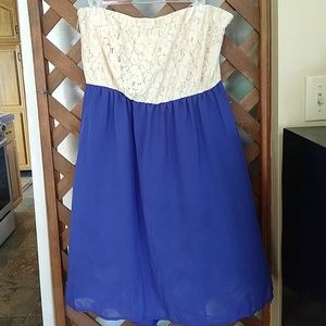 Deb's Strapless nude lace top with blue skirt